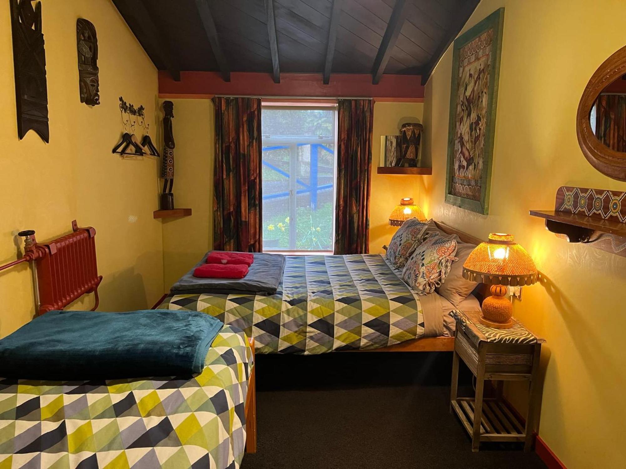 Global Village Travellers Lodge Greymouth Exterior photo The bedroom at the Old School House
